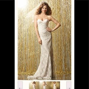 WToo strapless, sweetheart lace, with lace-covered buttons and sweep train.